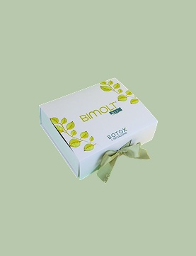 Caja personalizada Bimolt con lazo verde