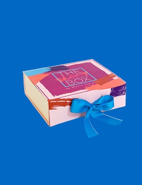 Caja de marca The Box con lazo azul